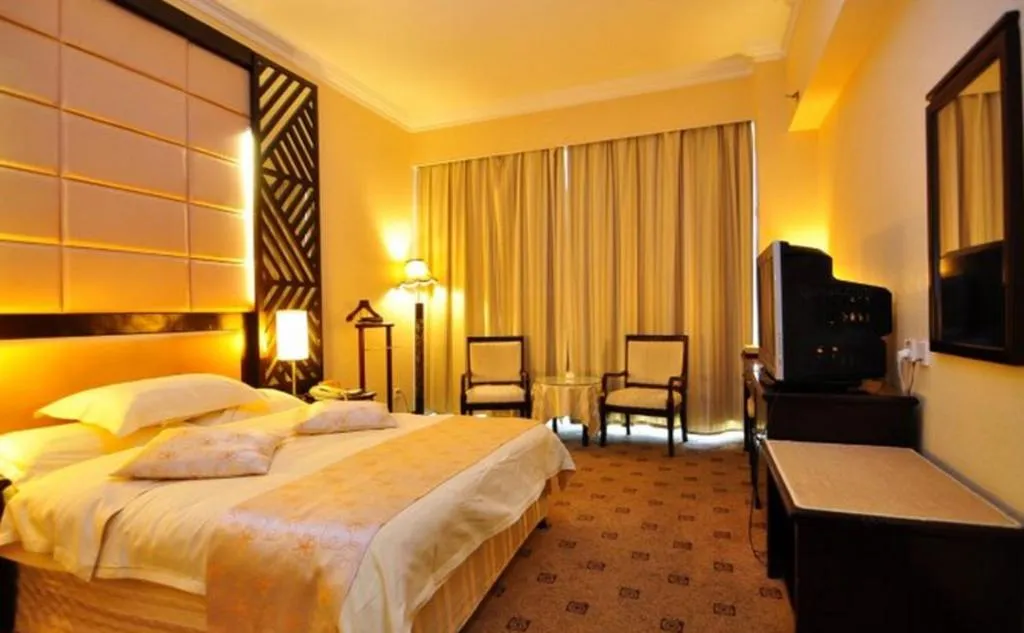 Bed in Economic Trade Hotel