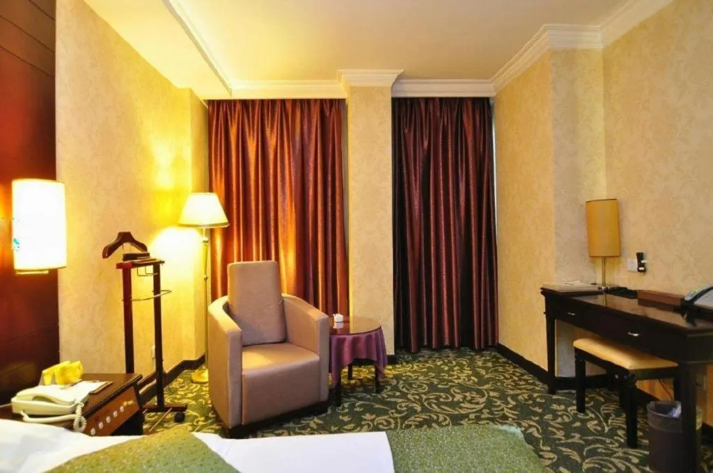 Bed in Economic Trade Hotel