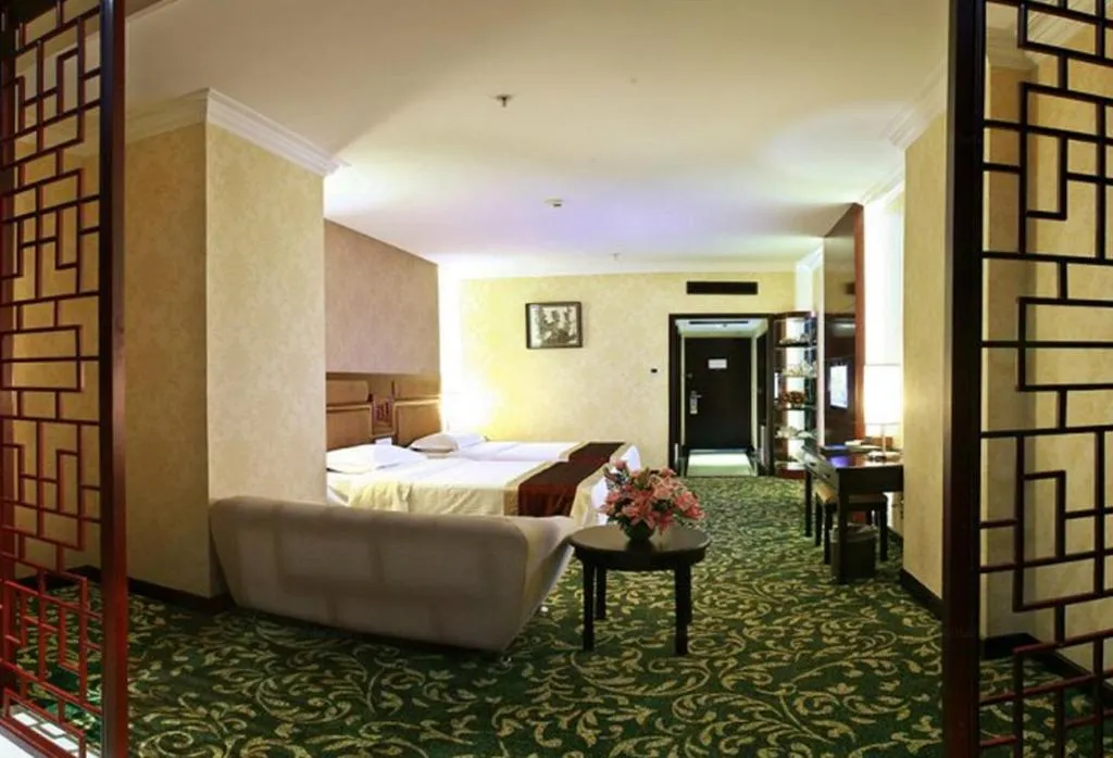 Bed in Economic Trade Hotel