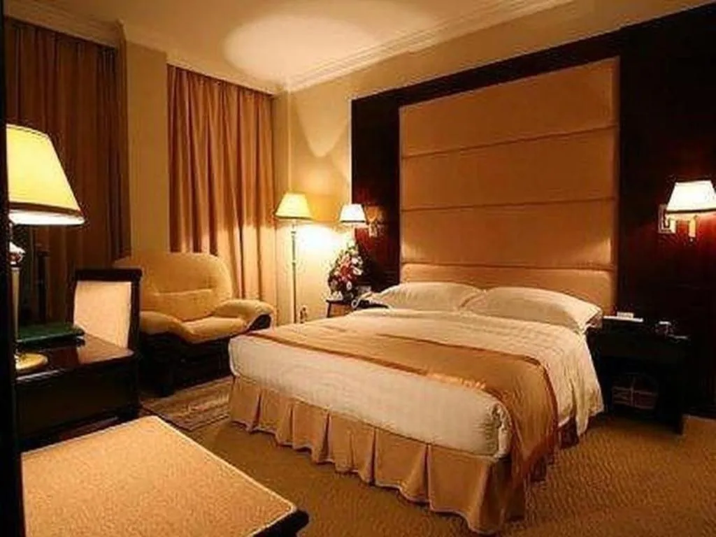 Bed in Economic Trade Hotel