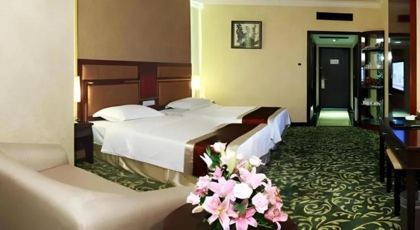 Bed in Economic Trade Hotel