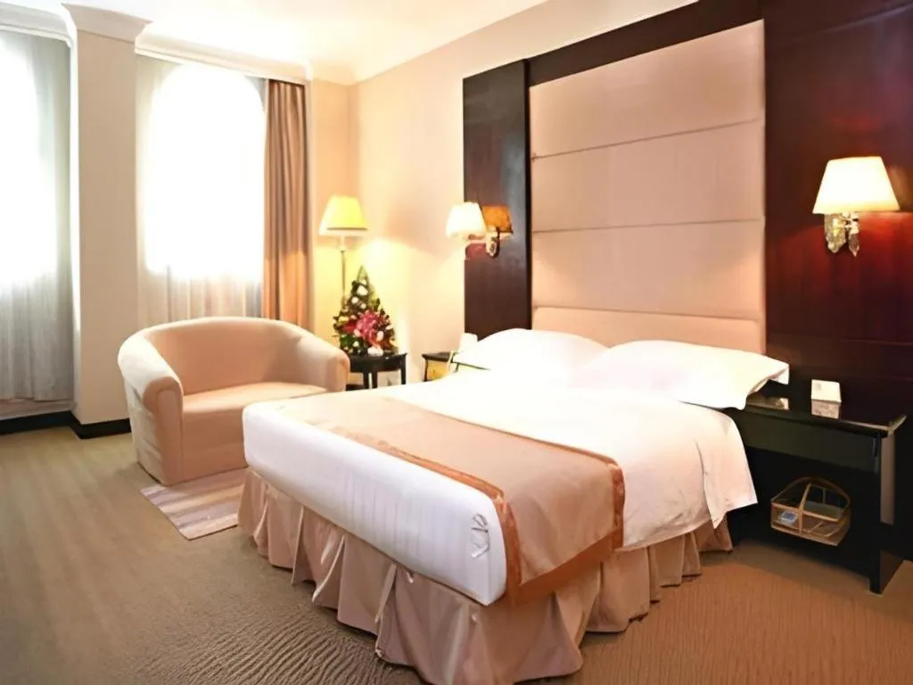 Bed in Economic Trade Hotel