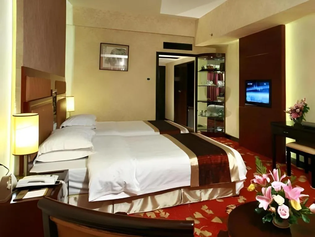 Bed in Economic Trade Hotel