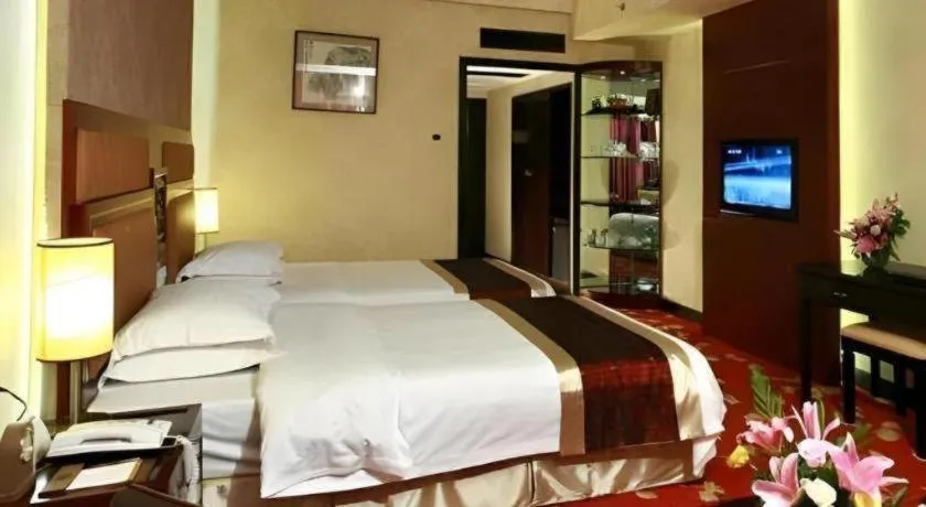Bed in Economic Trade Hotel