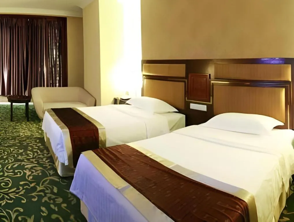 Bed in Economic Trade Hotel