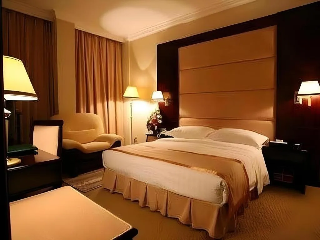 Bed in Economic Trade Hotel