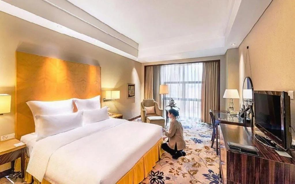 Bed in Kunshan Newport Hotel