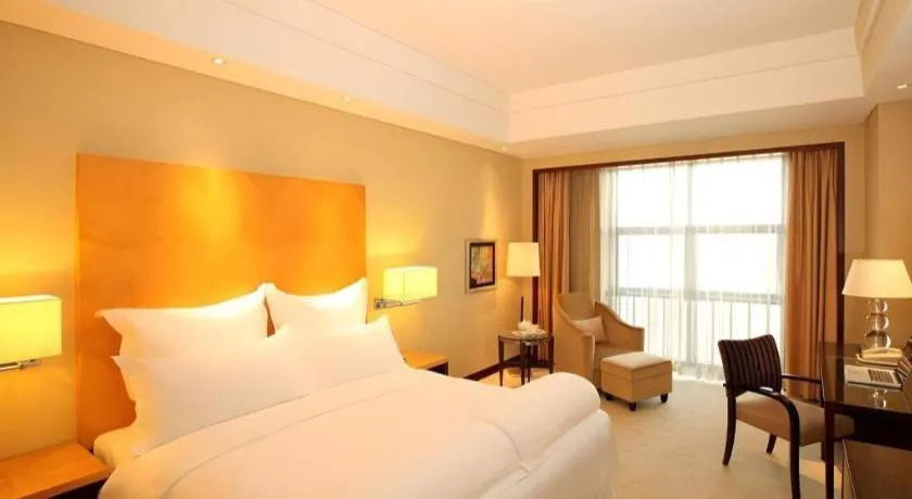 Bed in Kunshan Newport Hotel
