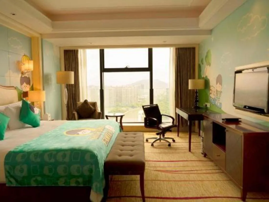 Bed in New Century Grand Hotel Zhejiang Sanli