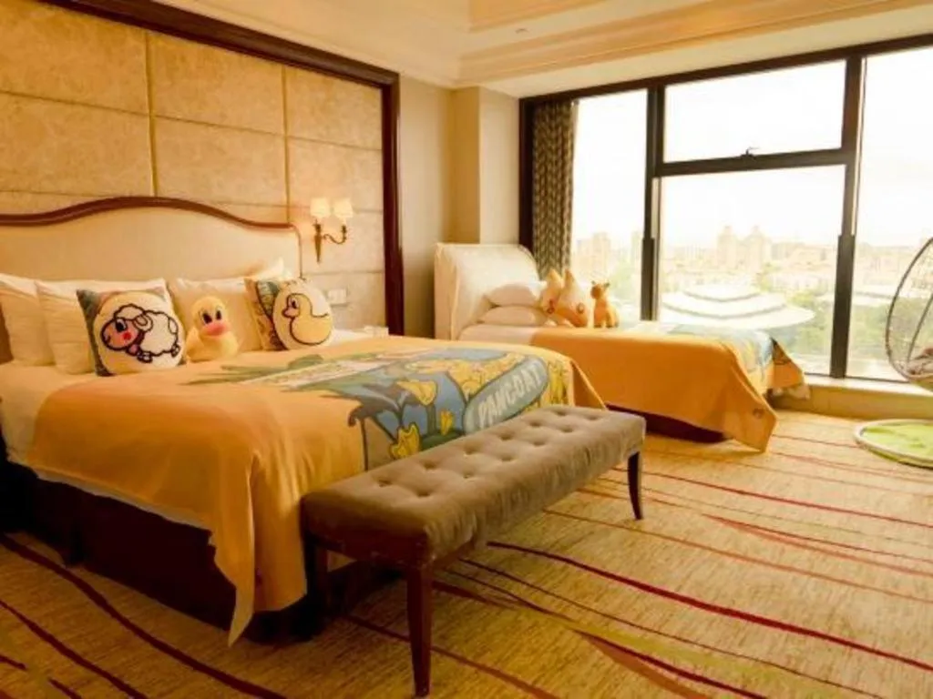 Bed in New Century Grand Hotel Zhejiang Sanli
