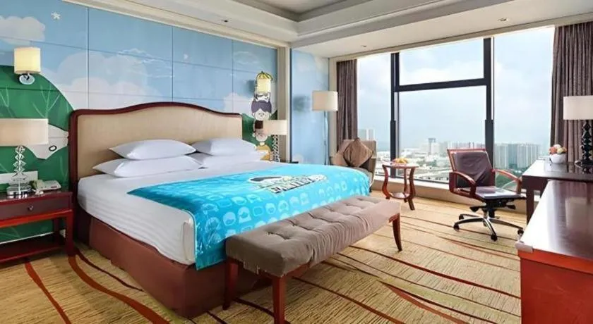 Bed in New Century Grand Hotel Zhejiang Sanli