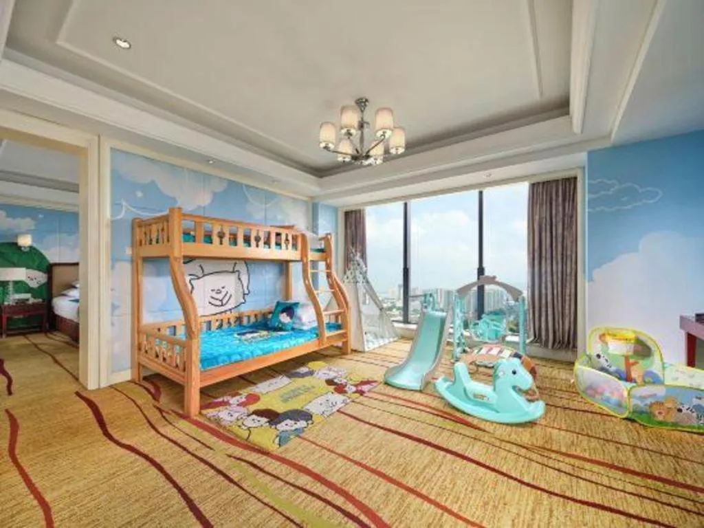 Bed in New Century Grand Hotel Zhejiang Sanli