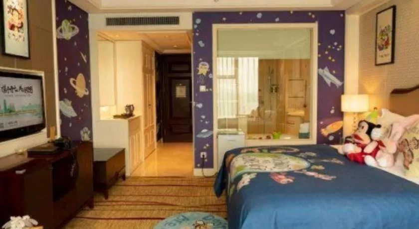 Bed in New Century Grand Hotel Zhejiang Sanli