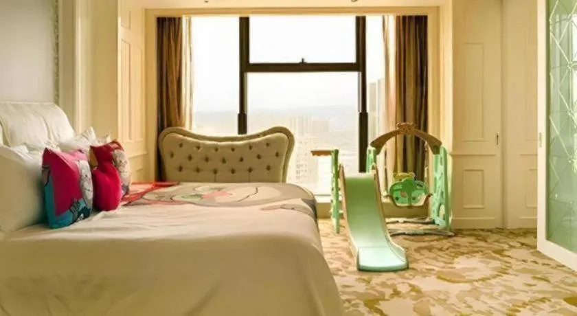 Bed in New Century Grand Hotel Zhejiang Sanli