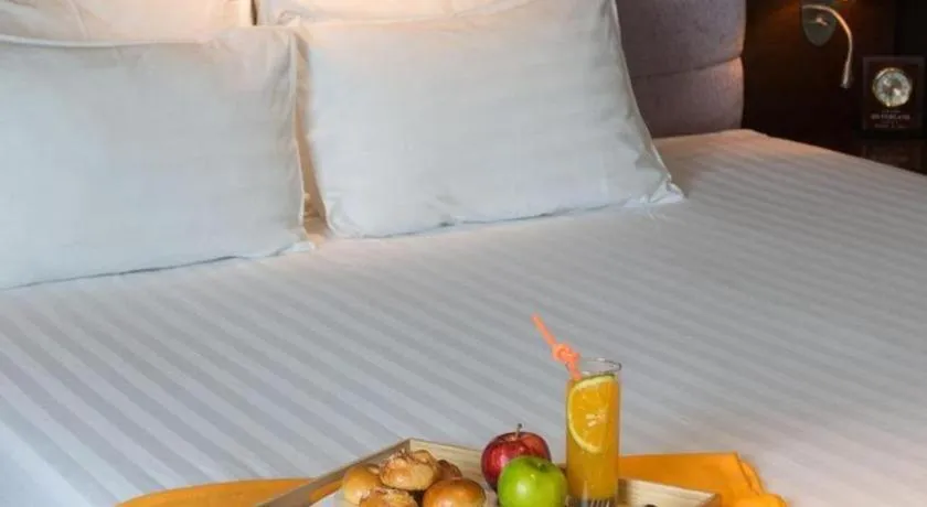 Bed in Grand Silverland Hotel