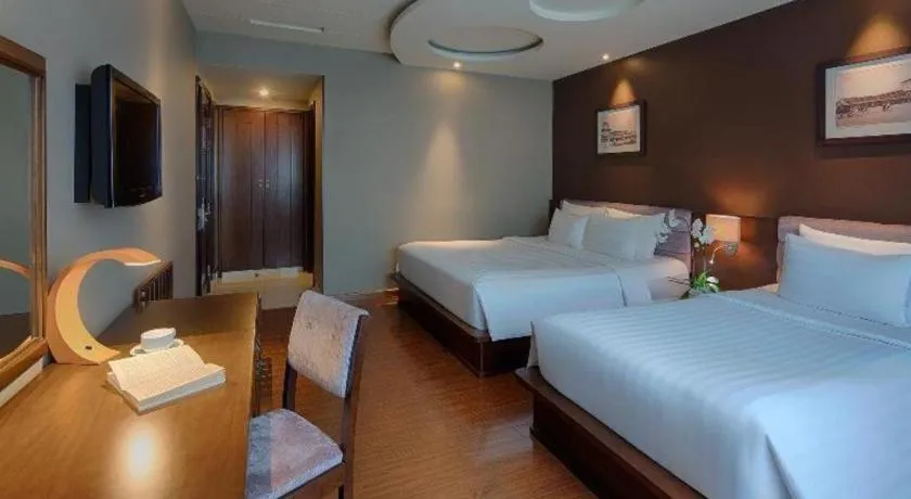 Bed in Grand Silverland Hotel