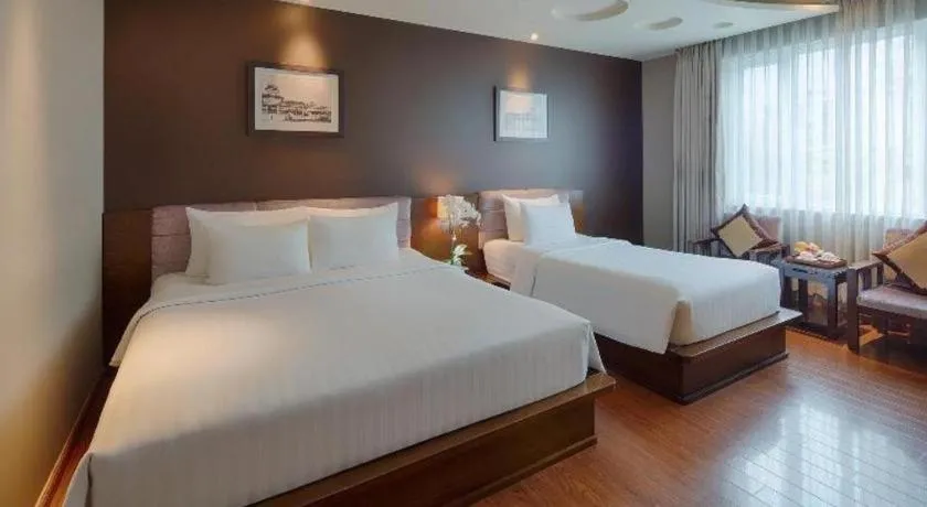 Bed in Grand Silverland Hotel