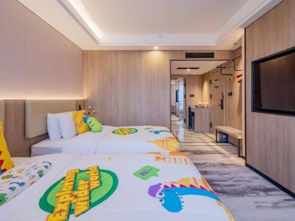 Bed in Jiaxing Fortune Holiday Hotel