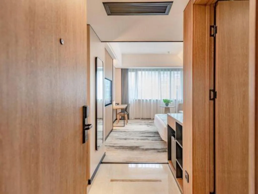 Bed in Jiaxing Fortune Holiday Hotel