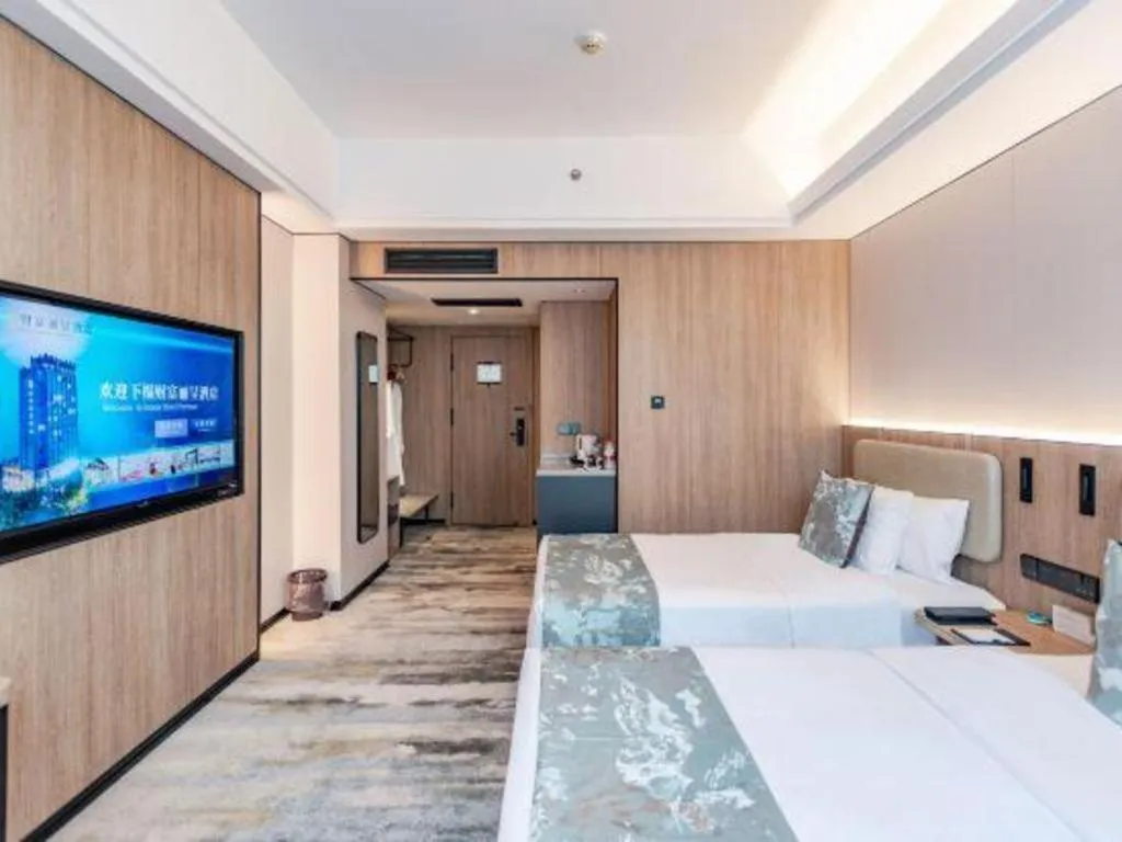 Bed in Jiaxing Fortune Holiday Hotel