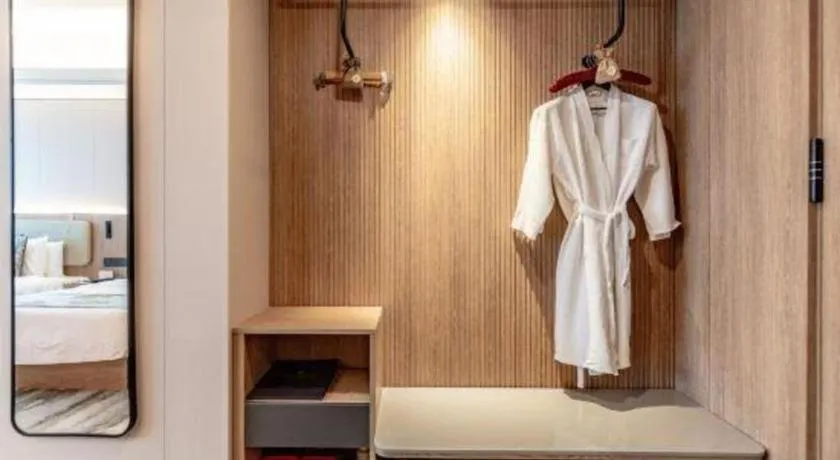 Bed in Jiaxing Fortune Holiday Hotel