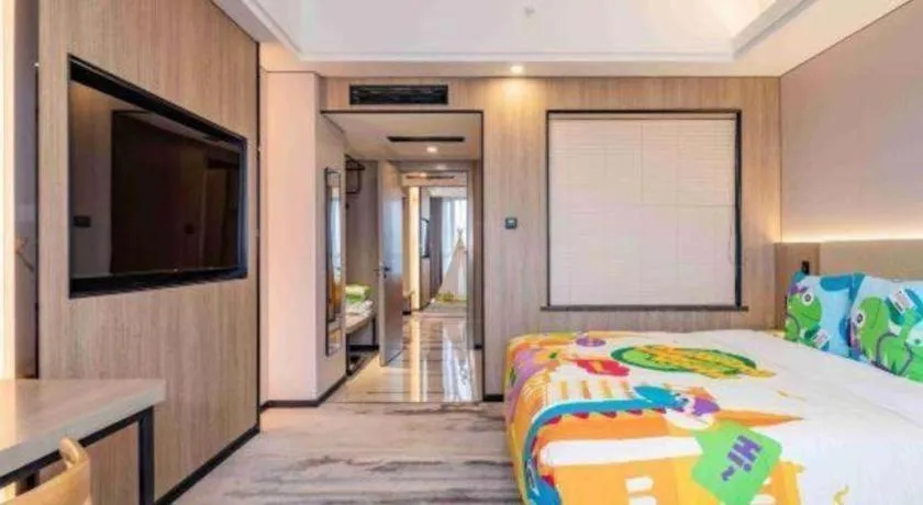 Bed in Jiaxing Fortune Holiday Hotel