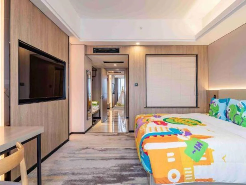 Bed in Jiaxing Fortune Holiday Hotel