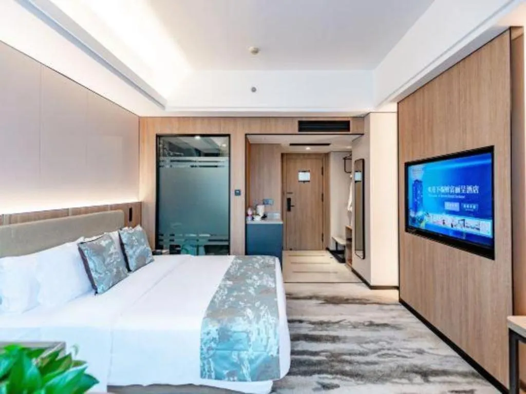 Bed in Jiaxing Fortune Holiday Hotel