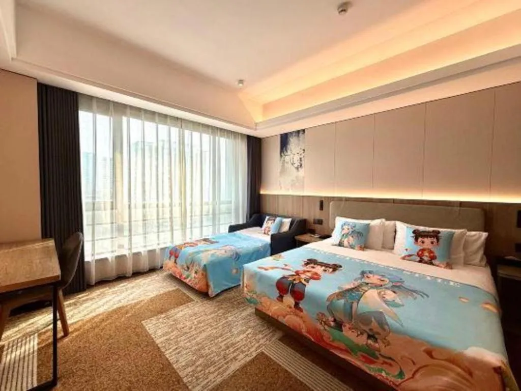 Bed in Jiaxing Fortune Holiday Hotel