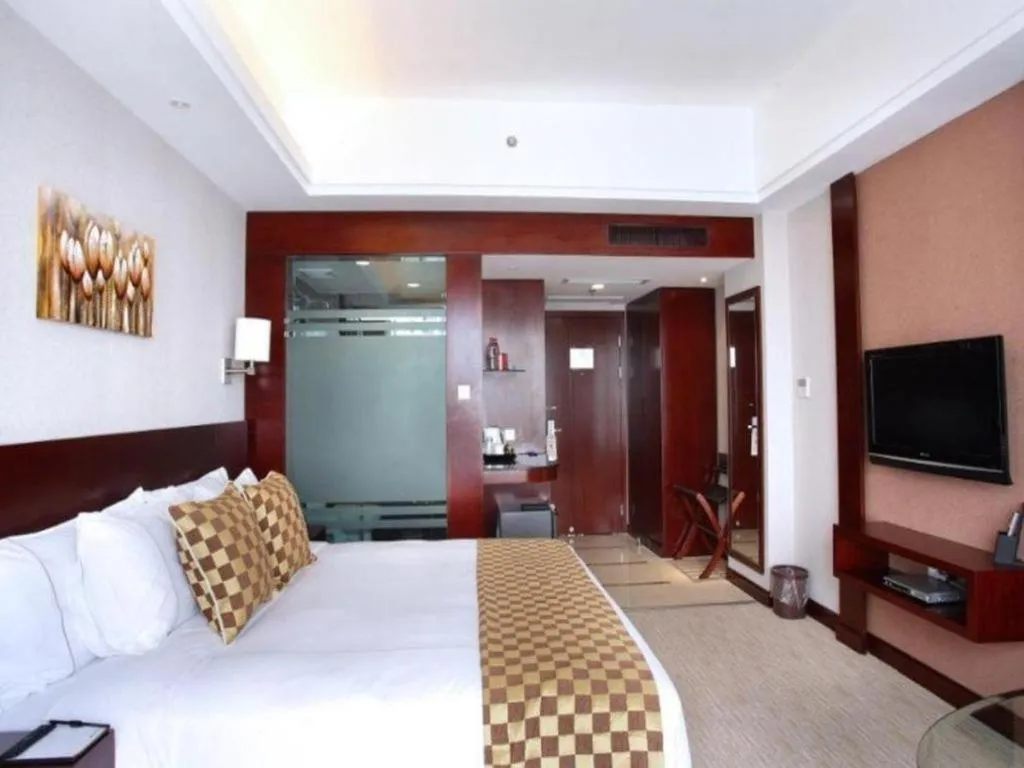 Bed in Jiaxing Fortune Holiday Hotel