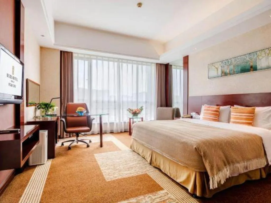 Bed in Jiaxing Fortune Holiday Hotel