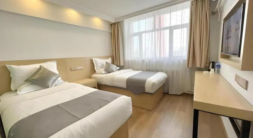 Bed in GreenTree Inn Urumqi South Xinhua Road Hotel