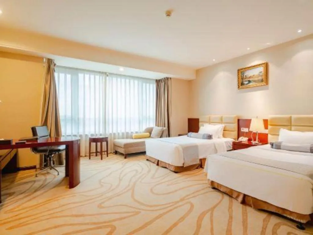 Bed in Chengdu Sovereign Hotel