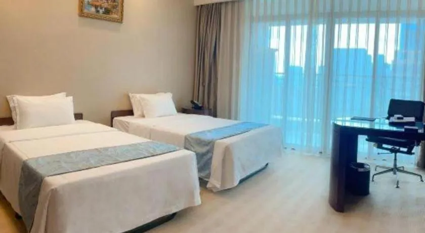 Bed in Chengdu Sovereign Hotel