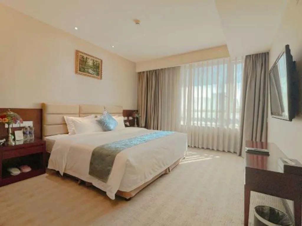 Bed in Chengdu Sovereign Hotel