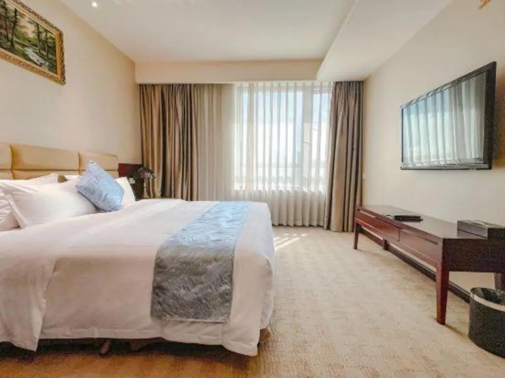 Bed in Chengdu Sovereign Hotel