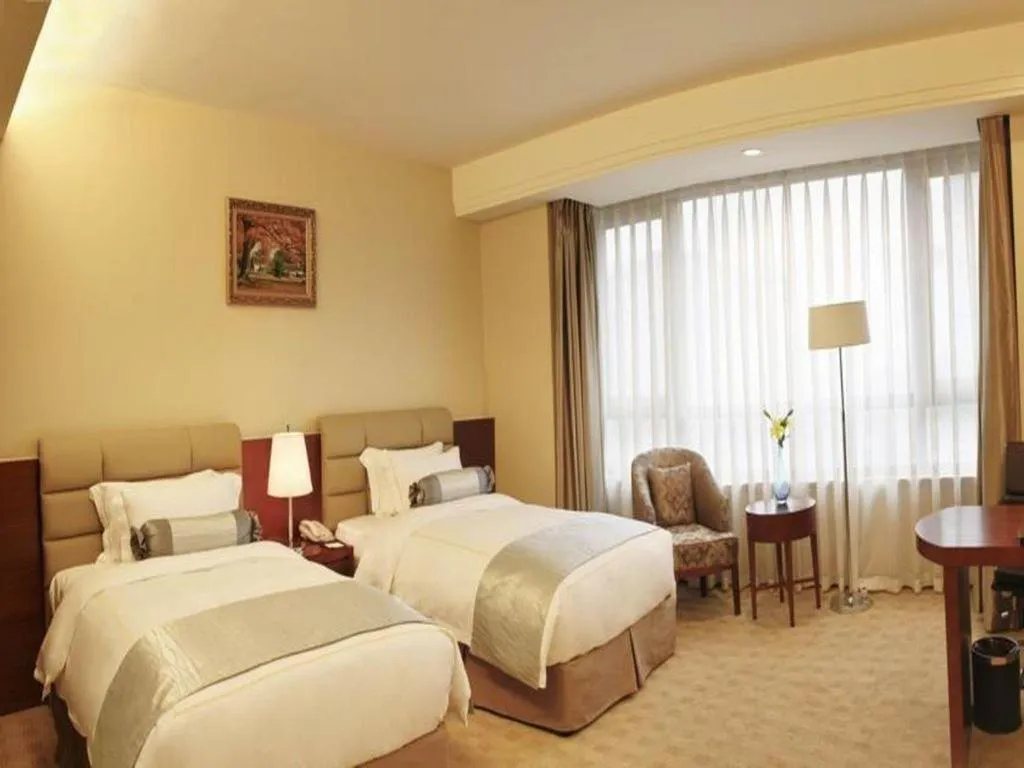 Bed in Chengdu Sovereign Hotel