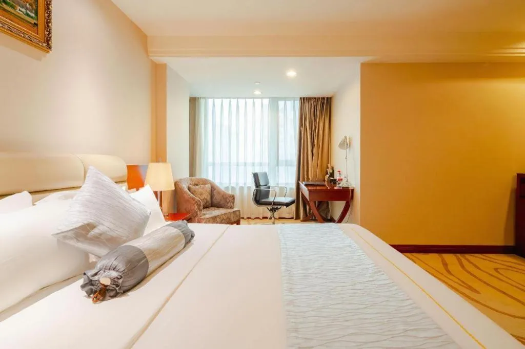 Bed in Chengdu Sovereign Hotel