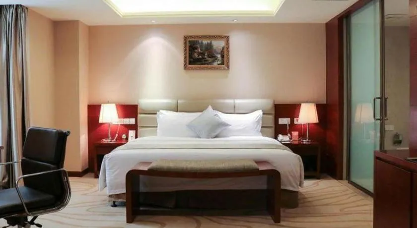 Bed in Chengdu Sovereign Hotel