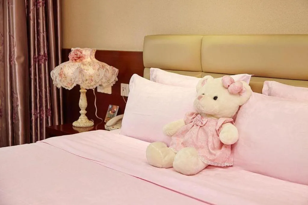 Bed in Chengdu Sovereign Hotel