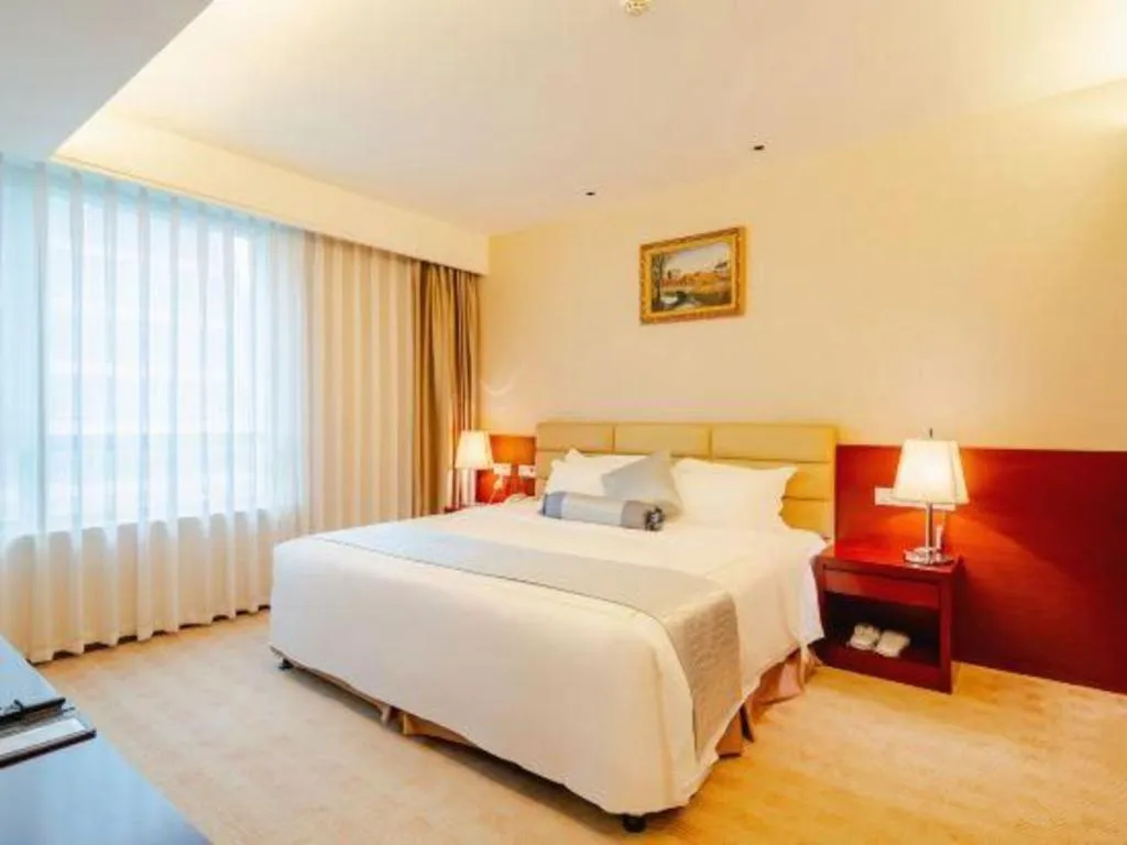 Bed in Chengdu Sovereign Hotel