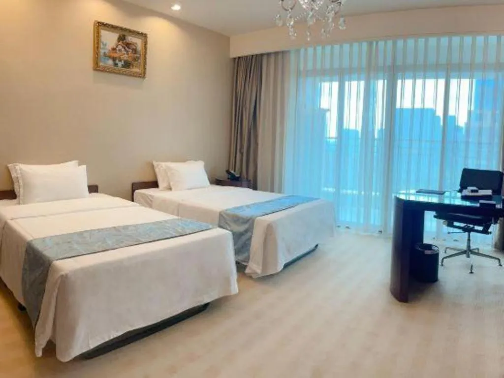 Bed in Chengdu Sovereign Hotel