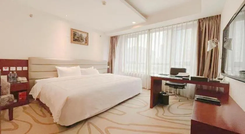 Bed in Chengdu Sovereign Hotel