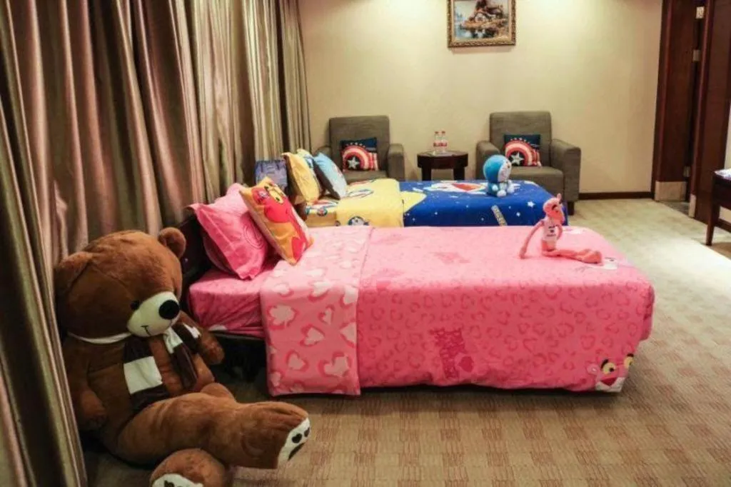 Bed in Chengdu Sovereign Hotel