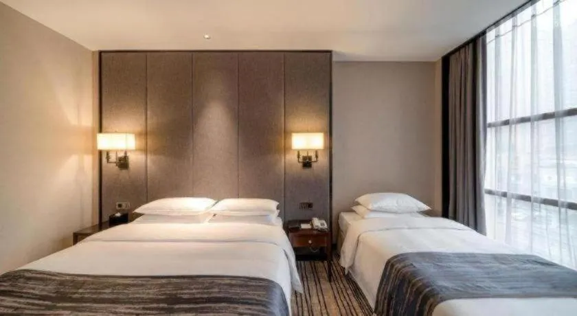 Bed in Green Westdon Hotel