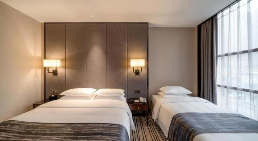 Bed in Green Westdon Hotel