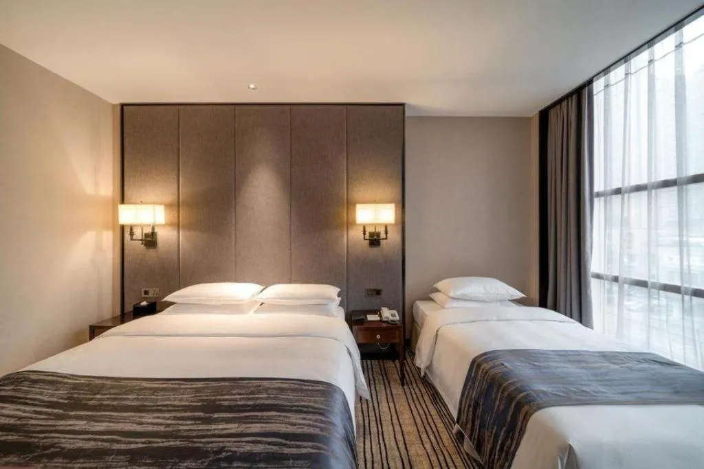 Bed in Green Westdon Hotel