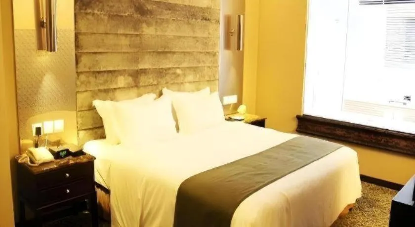 Bed in Green Westdon Hotel