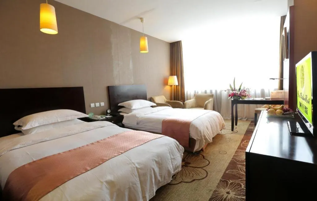 Bed in Green Westdon Hotel