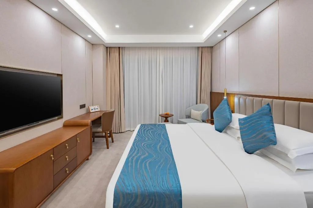 Bed in Yichang Three Gorges Project Hotel